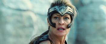 Movie still from “Wonder Woman” (2017), directed by Patty Jenkins – A person wearing a helmet; Close Up shot, Low angle
