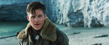 Movie still from “Wonder Woman” (2017), directed by Patty Jenkins – A person wearing a jacket with a fur collar; Close Up shot, Over the shoulder angle