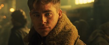 Movie still from “Wonder Woman” (2017), directed by Patty Jenkins – A person wearing a jacket; Close Up shot, Over the shoulder angle