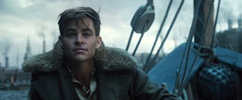 Movie still from “Wonder Woman” (2017), directed by Patty Jenkins – A person wearing a jacket; Close Up shot, Low angle