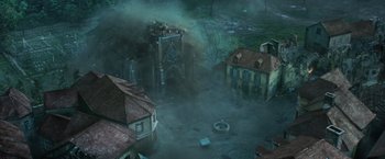 Movie still from “Wonder Woman” (2017), directed by Patty Jenkins – An aerial view of an old town with smoke billowing out of it; Extreme Wide shot, High angle