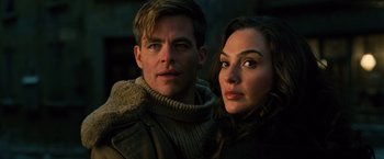 Movie still from “Wonder Woman” (2017), directed by Patty Jenkins – A man and a woman standing next to each other; Close Up shot, Low angle