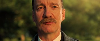 Movie still from “Wonder Woman” (2017), directed by Patty Jenkins – A person with a mustache; Close Up shot, Low angle