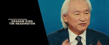 Movie still from “World War Z” (2013), directed by Marc Forster – An image of a man in a suit and tie; Close Up shot, Over the shoulder angle