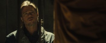 Movie still from “World War Z” (2013), directed by Marc Forster – A person looking at a mirror; Close Up shot, Over the shoulder angle
