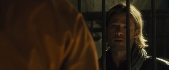 Movie still from “World War Z” (2013), directed by Marc Forster – A man looking at himself in the mirror; Close Up shot, Over the shoulder angle