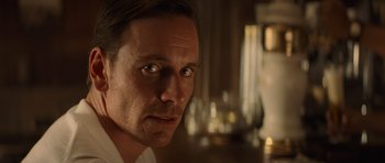 Movie still from “X-Men: First Class” (2011), directed by Matthew Vaughn – A person looking at the camera; Close Up shot, Over the shoulder angle