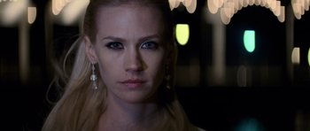 Movie still from “X-Men: First Class” (2011), directed by Matthew Vaughn – A beautiful woman with blue eyes and blond hair; Close Up shot, Low angle