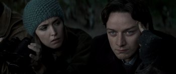 Movie still from “X-Men: First Class” (2011), directed by Matthew Vaughn – A man and a woman sitting next to each other; Close Up shot, Low angle