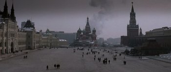 Movie still from “X-Men: First Class” (2011), directed by Matthew Vaughn – A group of people walking across a snow covered ground; Extreme Wide shot, High angle