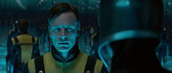 Movie still from “X-Men: First Class” (2011), directed by Matthew Vaughn – A person wearing a yellow and black jacket; Close Up shot, Over the shoulder angle