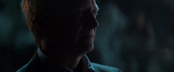 Movie still from “X-Men” (2000), directed by Bryan Singer – A person's face in the dark; Close Up shot, Over the shoulder angle