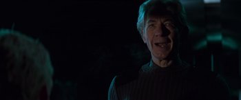 Movie still from “X-Men” (2000), directed by Bryan Singer – An older man is smiling for the camera; Close Up shot, Low angle