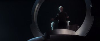 Movie still from “X-Men” (2000), directed by Bryan Singer – A man standing in front of a mirror in a dark room; Medium shot, Low angle