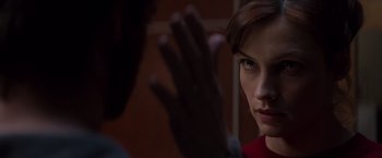 Movie still from “X-Men” (2000), directed by Bryan Singer – A person with their hand up; Close Up shot, Over the shoulder angle