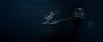 Movie still from “X-Men” (2000), directed by Bryan Singer – A man sitting on top of a chair in the middle of the night; Extreme Wide shot, High angle