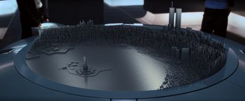 Movie still from “X-Men” (2000), directed by Bryan Singer – A statue of liberty in the middle of a city; Extreme Wide shot, High angle