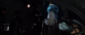 Movie still from “X-Men” (2000), directed by Bryan Singer – The statue of liberty is lit up at night; Medium shot, Low angle