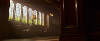 Movie still from “X-Men: Apocalypse” (2016), directed by Bryan Singer – A room filled with furniture next to a large window; Extreme Wide shot, Low angle