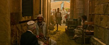 Movie still from “X-Men: Apocalypse” (2016), directed by Bryan Singer – A group of people walking down a street; Wide shot, Over the shoulder angle