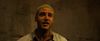 Movie still from “X-Men: Apocalypse” (2016), directed by Bryan Singer – A person wearing a hat; Close Up shot, Low angle