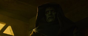 Movie still from “X-Men: Apocalypse” (2016), directed by Bryan Singer – A person wearing a robe and a hood; Close Up shot, Low angle