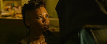 Movie still from “X-Men: Apocalypse” (2016), directed by Bryan Singer – A person with a hand on their shoulder; Close Up shot, Over the shoulder angle