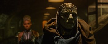 Movie still from “X-Men: Apocalypse” (2016), directed by Bryan Singer – A person wearing a mask; Close Up shot, Over the shoulder angle