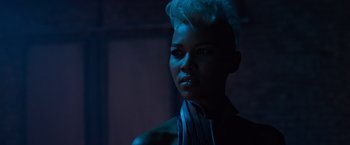 Movie still from “X-Men: Apocalypse” (2016), directed by Bryan Singer – A person wearing a black shirt; Close Up shot, Low angle