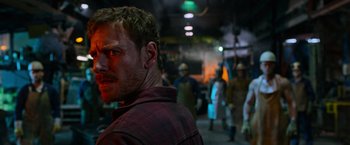 Movie still from “X-Men: Apocalypse” (2016), directed by Bryan Singer – A person wearing a plaid shirt; Close Up shot, Low angle