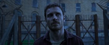 Movie still from “X-Men: Apocalypse” (2016), directed by Bryan Singer – A person looking up at the sky; Close Up shot, Low angle