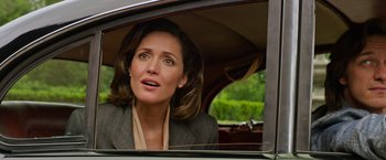 Movie still from “X-Men: Apocalypse” (2016), directed by Bryan Singer – A woman sitting in the back seat of a car; Close Up shot, Low angle