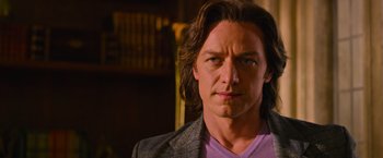 Movie still from “X-Men: Apocalypse” (2016), directed by Bryan Singer – A person with long brown hair; Close Up shot, Over the shoulder angle