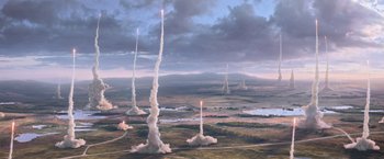 Movie still from “X-Men: Apocalypse” (2016), directed by Bryan Singer – A group of rockets are flying in the sky; Extreme Wide shot, Overhead angle