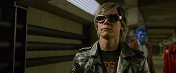 Movie still from “X-Men: Apocalypse” (2016), directed by Bryan Singer – A man wearing sunglasses and a leather jacket; Close Up shot, Low angle