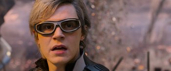 Movie still from “X-Men: Apocalypse” (2016), directed by Bryan Singer – A man wearing a pair of sunglasses and a leather jacket; Close Up shot, Over the shoulder angle