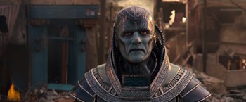 Movie still from “X-Men: Apocalypse” (2016), directed by Bryan Singer – A person wearing a costume; Close Up shot, Low angle