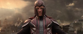 Movie still from “X-Men: Apocalypse” (2016), directed by Bryan Singer – A man wearing a costume and a helmet; Close Up shot, Low angle