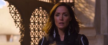 Movie still from “X-Men: Apocalypse” (2016), directed by Bryan Singer – A person wearing a suit and tie; Close Up shot, Over the shoulder angle