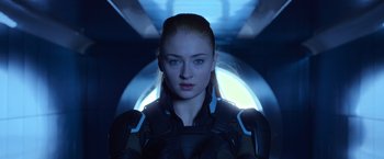Movie still from “X-Men: Apocalypse” (2016), directed by Bryan Singer – A woman with blonde hair and blue eyes; Close Up shot, Low angle