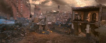 Movie still from “X-Men: Apocalypse” (2016), directed by Bryan Singer – An image of an apocalyptic scene with a man flying in the sky; Extreme Wide shot, High angle