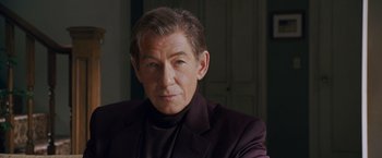 Movie still from “X-Men: The Last Stand” (2006), directed by Brett Ratner – A person wearing a suit; Close Up shot, Over the shoulder angle