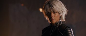 Movie still from “X-Men: The Last Stand” (2006), directed by Brett Ratner – A person with a white hair and a black jacket; Close Up shot, Low angle