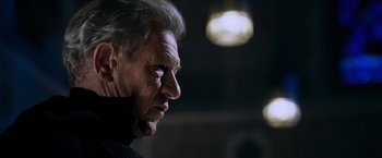 Movie still from “X-Men: The Last Stand” (2006), directed by Brett Ratner – An older man with gray hair looking to his left; Close Up shot, Low angle