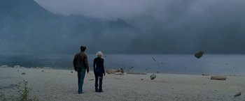 Movie still from “X-Men: The Last Stand” (2006), directed by Brett Ratner – A man and a woman walking on the beach; Extreme Wide shot, Low angle