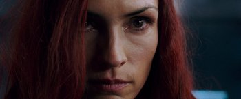 Movie still from “X-Men: The Last Stand” (2006), directed by Brett Ratner – A person with long red hair; Close Up shot, Low angle