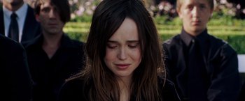 Movie still from “X-Men: The Last Stand” (2006), directed by Brett Ratner – A person with her eyes closed; Close Up shot, Over the shoulder angle