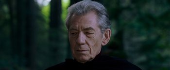 Movie still from “X-Men: The Last Stand” (2006), directed by Brett Ratner – An older man's face with trees in the background; Close Up shot, Low angle