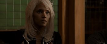 Movie still from “X2” (2003), directed by Bryan Singer – A woman with white hair is looking at the camera; Close Up shot, Over the shoulder angle