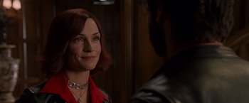 Movie still from “X2” (2003), directed by Bryan Singer – A person wearing a red shirt; Close Up shot, Over the shoulder angle